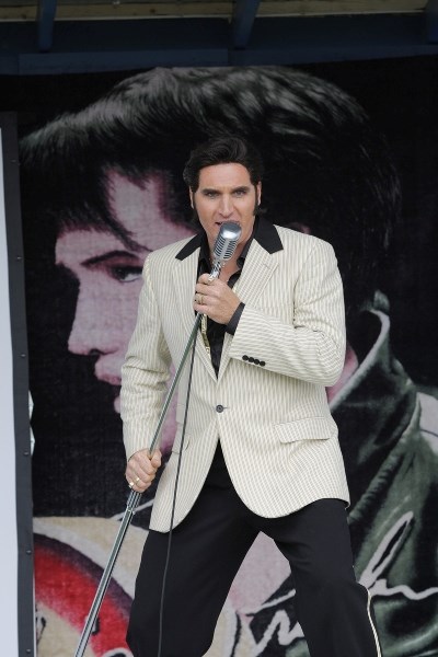 Rip it up: Ronnie Scott, from Burnaby, B.C. gets the Busby crowd all shook up during the weekend Blue Suede Elvis tribute festival which drew a huge crowd.