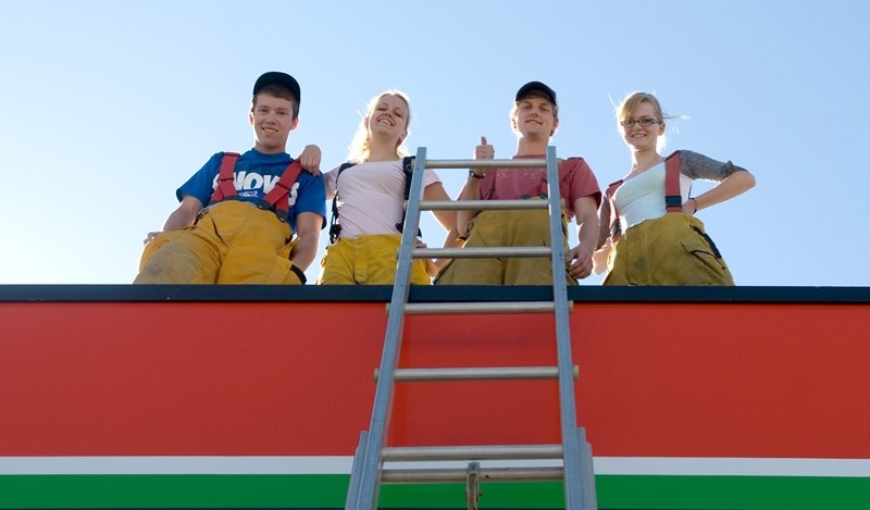 James Lee, Amanda Westbrook, Tyler Simoneau, and Hannah Bohaychuk spent 30 hours on the roof this weekend.