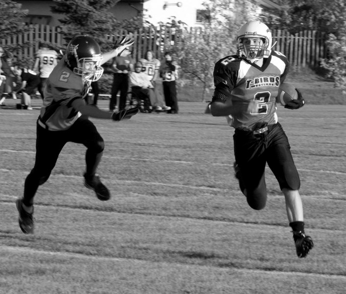 Westlock Thunderbirds quarterback Brett Snell ran in four of the T-Birds&#8217; five touchdowns in Westlock last Friday night.