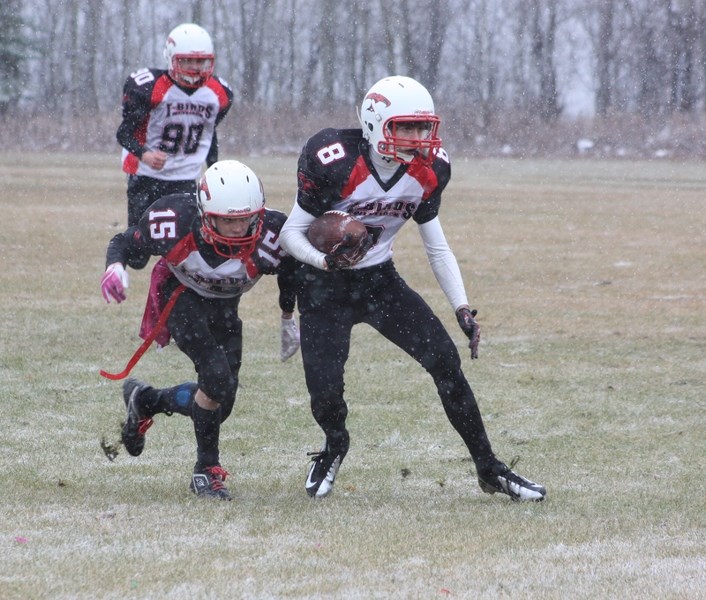 Westlock &#8216;s Josh Dittmer (8) and teammate Kash McCotter (15) in Athabasca.