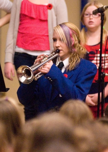 Morgan Simpson plays her part of Last Post, which she performed with Liam Holman at BES and BCHS.