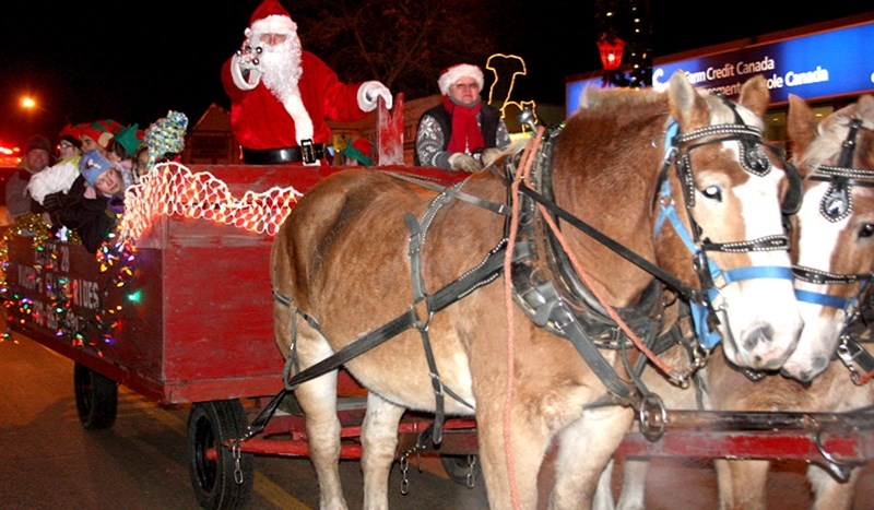 Much to the delight of a street full of children, Santa Claus made his jolly appearance on a horse-drawn sleigh in Barrhead&#8217;s Light Up parade Friday, Nov. 16. The