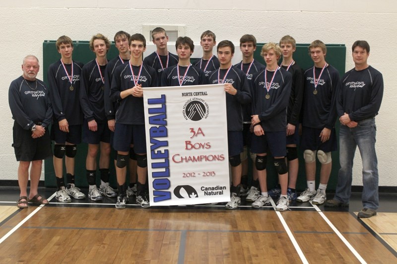 In the zone: Barrhead &#8216;s Senior Gryphons boys proudly display their zone banner proclaiming them 3A Boys Champions for this season. With them are coach Rod Callihoo and 