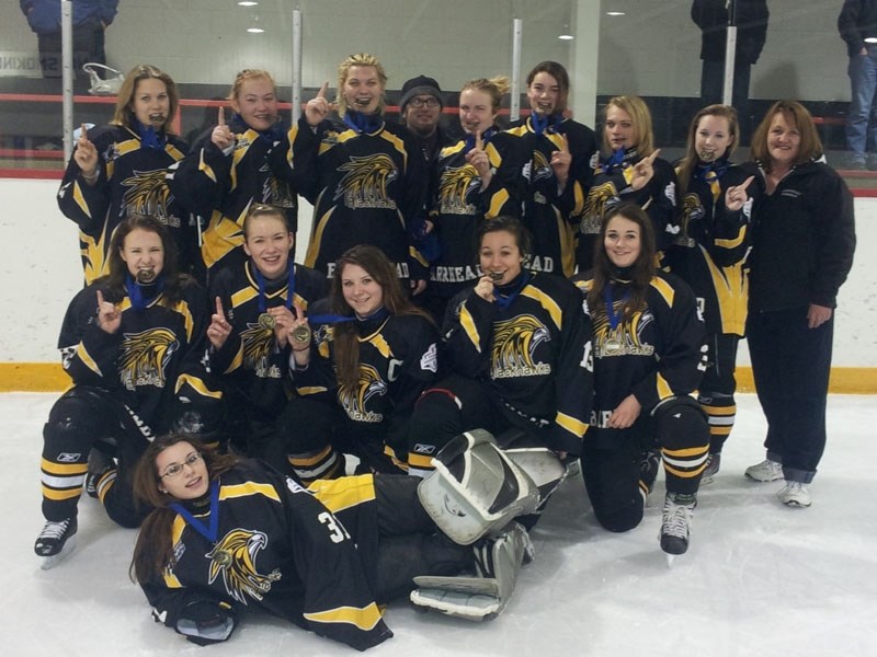 We are the champions: The Blackhawks after their victory. Pictured are Ashleigh Yelland, Sydney Vandenhouten, Sam Dodds, Morgan Melzer, Jamie Chomay, Leigha Schmaus, Justine