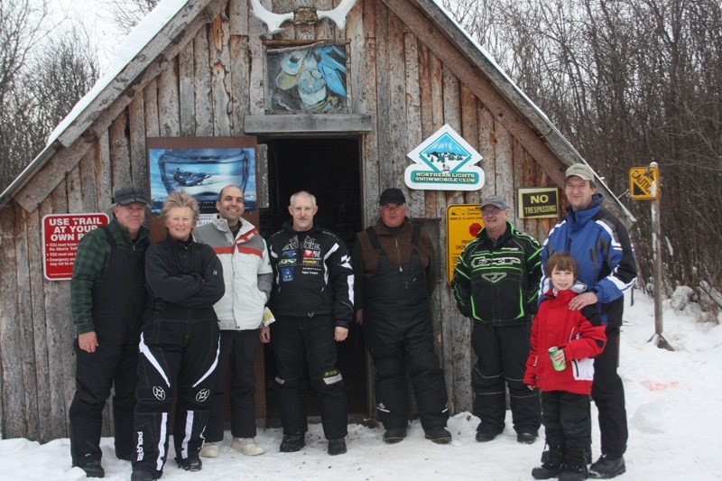 Shoal Lake Cabin crew: Pictured from the left are Murray and Cindy Kammerer, Dave Sawatzky, Steve Zunti, Perry Pickrell, Dale Bentz, Gary Belanger and son, Jonathan.