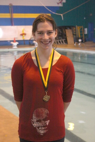 Swimming success: Barrhead schoolgirl Sarah Lutz with her medal after the weekend swim meet.