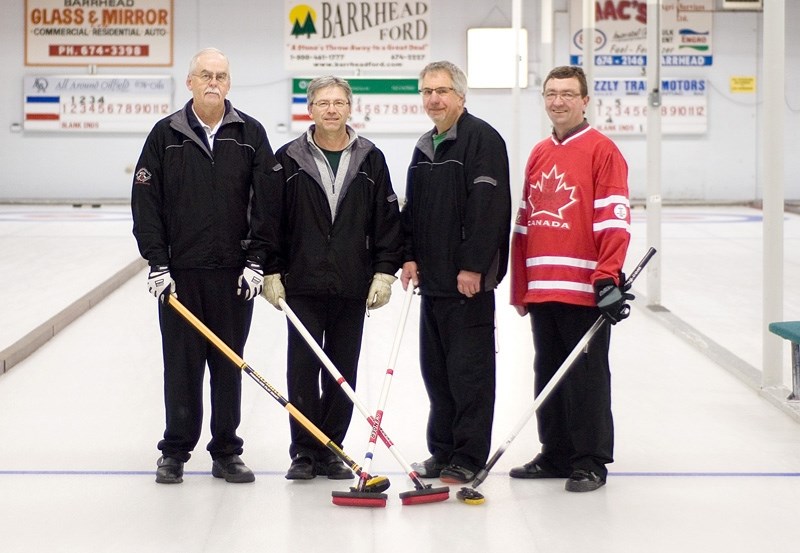 Skip John Strand, third Roy Hewitt, second Terry Franchuk, and Daryl Lindquist placed first in the Men &#8216;s Open Bonspiel March 1-2.