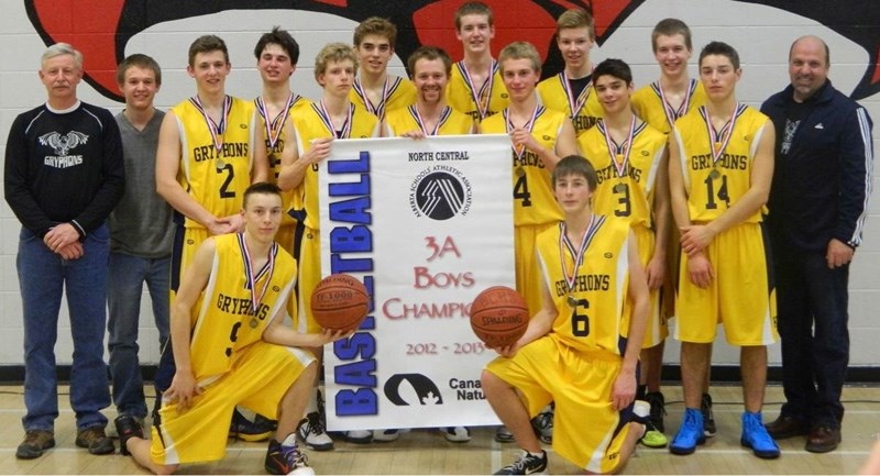 Simply the best: The Gryphons display their banner proclaiming them the best tem in Alberta &#8216;s north central zone. Pictured on the far right is coach Dave Mueller.