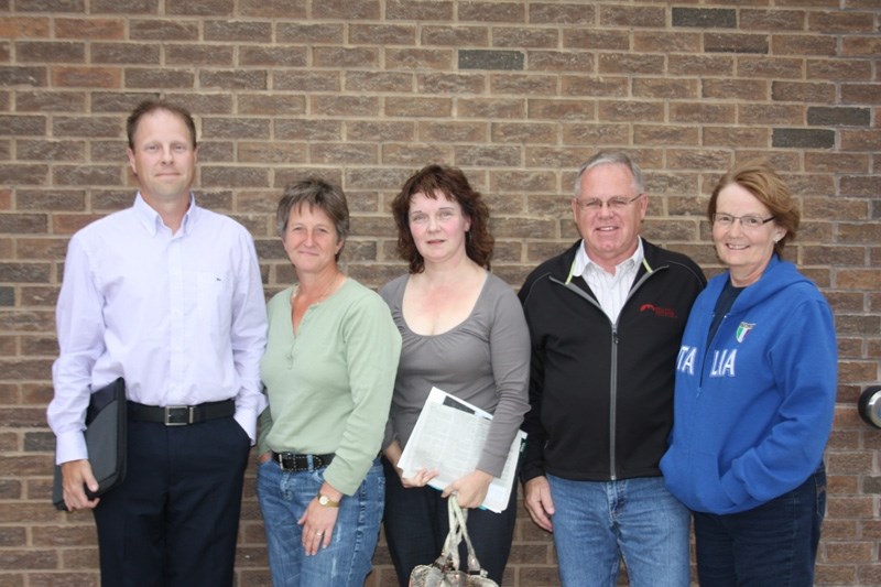 During last July &#8216;s flooding, sewage streamed into several properties. Affected residents included, left to right, Dean Rau, Veronica Properzi, Sandra Cober, Dennis