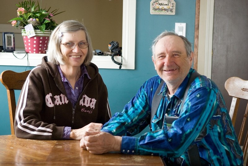 Lenard and Edna Jennings sit at the table at their house in Westlock, a temporary stay after their Linaria home was lost in a fire Feb. 13. The couple, who take care of their 