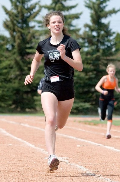 Barrhead Composite Grade 8 student Jill Starman runs towards the finish line during the 200m dash, coming in first place. Starman qualified for zones in this event.