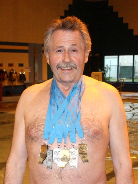 Richard Jacobs, with his six medals from the 2011 Summer Games.
