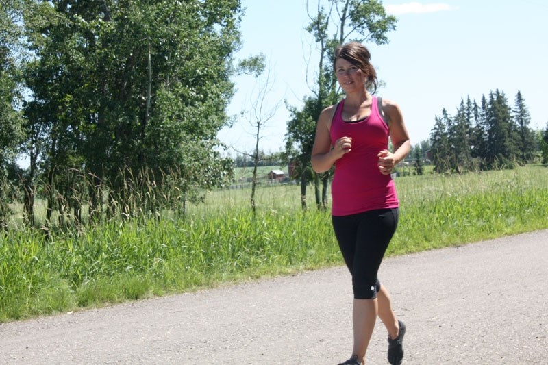 Joni Kindt pictured in training for her 143 kilometre run/walk/crawl. She is looking for donations to help cover adoption costs for friends, Candra and Riley Sexton.