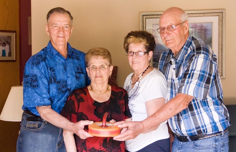 From left: Bert and Mary Dub é;, and Art and Norma Brand are all looking forward to the Games, not only for the floor curling but to meet new people who share the same