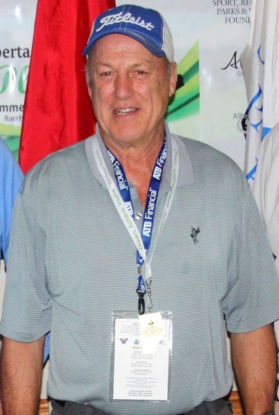Norm Miller, pictured with the gold medal he won during the Alberta 55 Plus Summer Games.