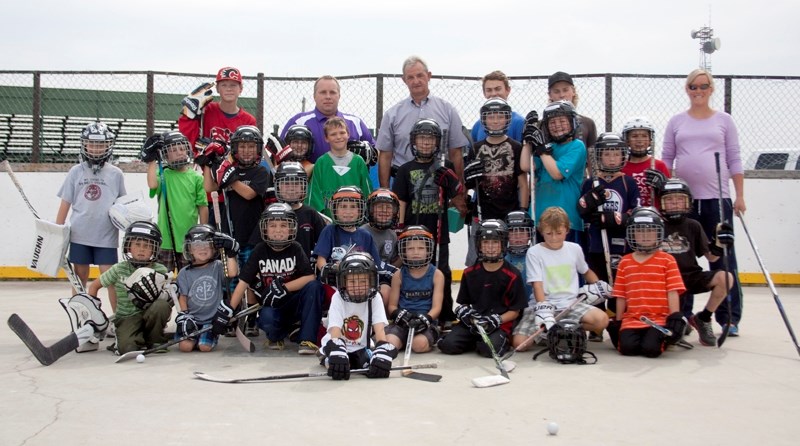 Darryl Sutter was a star guest when these youngsters took part in Barrhead &#8216;s Pro North Hockey Conditioning camp on Wednesday, Aug. 14 in the outside hockey rink by the 
