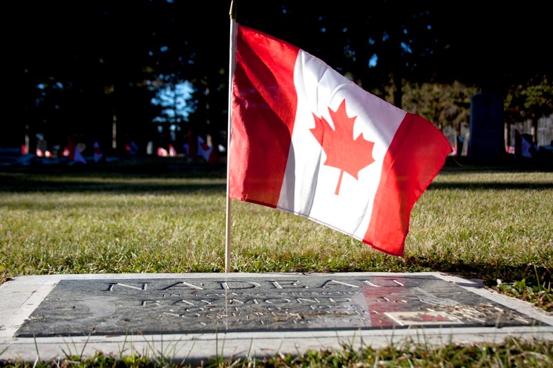 Canadian flags decorate the gravesites at the Field of Honour in Barrhead. Remembrance Day commemorations on Nov. 11 will start at 9 a.m. with the formation of a parade