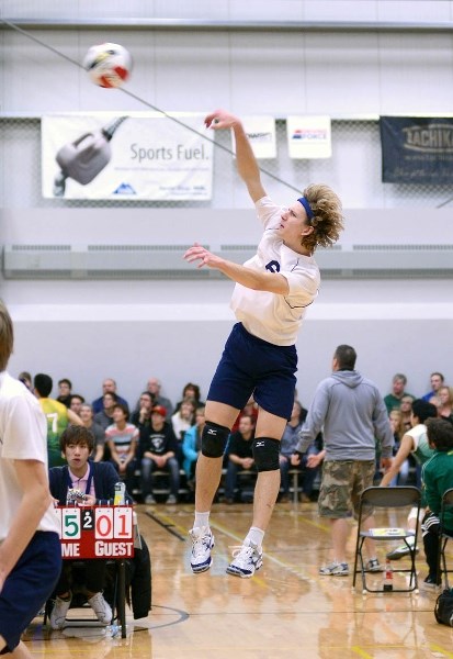 Eli Nanninga jumps and spikes the ball over the net during the semi-final game against St. Joseph &#8216;s Celtics on Saturday. Barrhead claimed a victory over the Celtics,