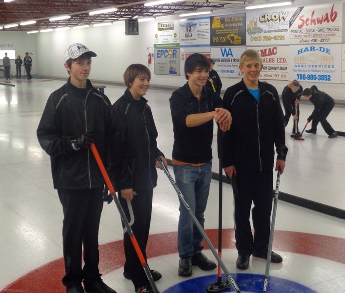 Fifteen-year-olds Brayden Borle (skip), Stuart Phillips (third), Jacob Kiselyk (second), and Ryan DenBroeder (lead) claimed first place in a bonspiel hosted in Warburg Jan.