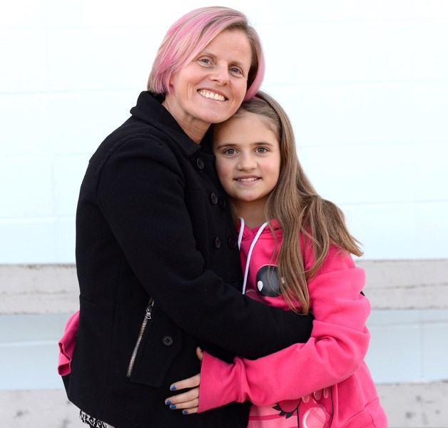 Colleen Bauer and her daughter Keana are raising money for the 2014 Hair Massacure event Feb. 14, where they will shave their heads. Keana has been growing her hair for two