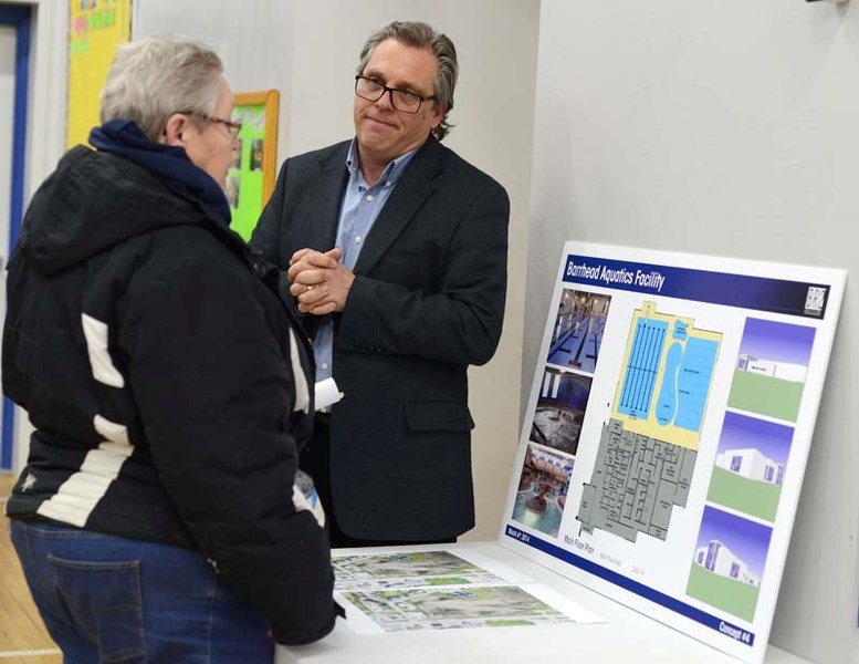 Lac La Nonne resident Llowyin Fournier talks to architect Steven Bushnell about the current pool concept.