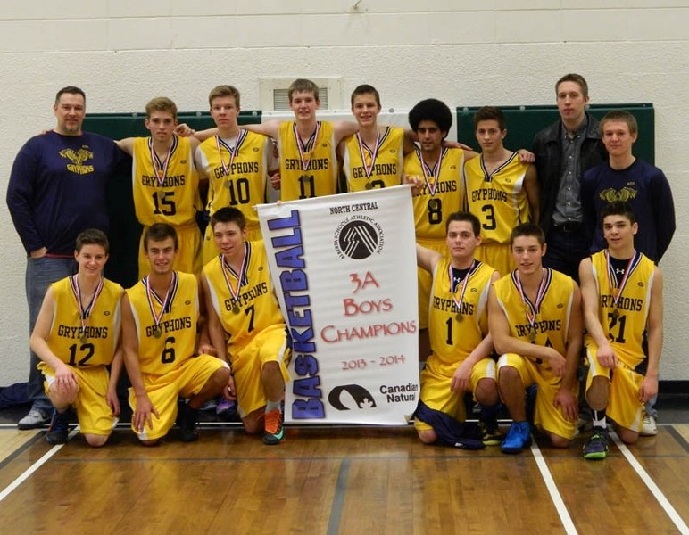Golden moment: The Barrhead senior boys Gryphons parade the banner proclaiming them North Central 3A Boys Champions for 2013-14. On the roster this year are: Tyson Grohn,