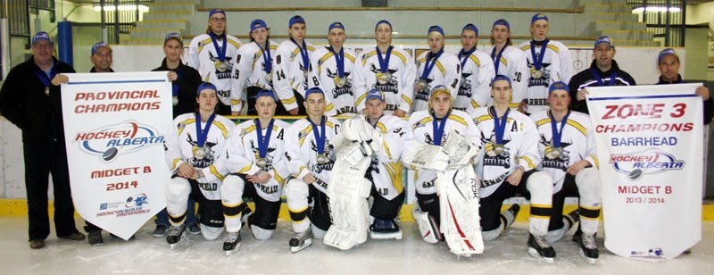 Team effort: The victorious Barrhead Steelers and their coaching staff assembled on the Agrena ice last Wednesday evening to display the winning banners. The players also
