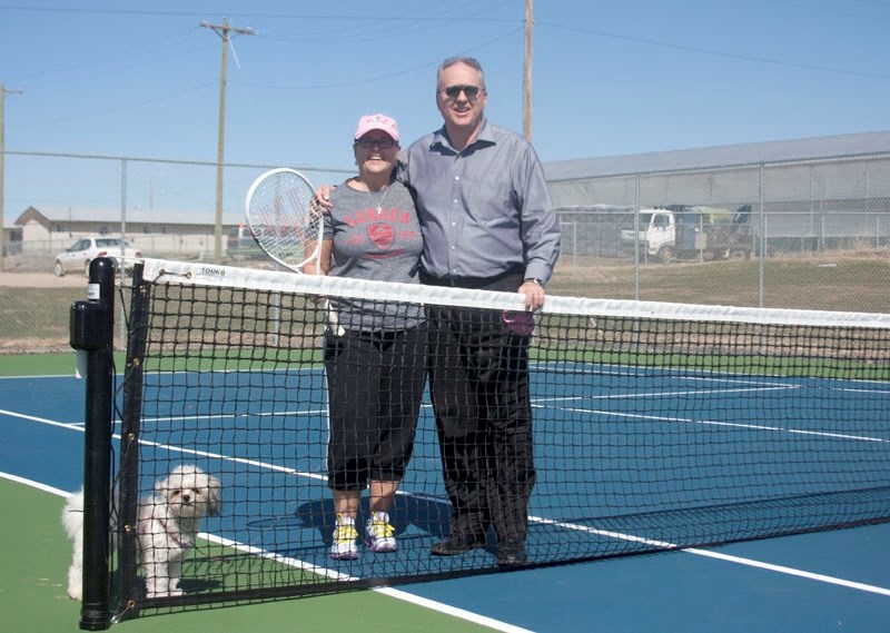 Martin Taylor and his wife, Sharon, who are inviting people to play tennis with them on Tuesday and Thursday evenings at the town &#8216;s new tennis courts. It seems like