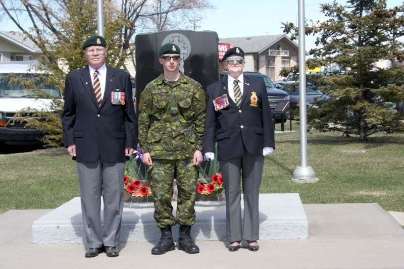 Standing proud: Three people laid wreathes during Friday &#8216;s Day of Honour in Barrhead. They were (left to right) Lyle Saumer, who served with the Princess Patricia