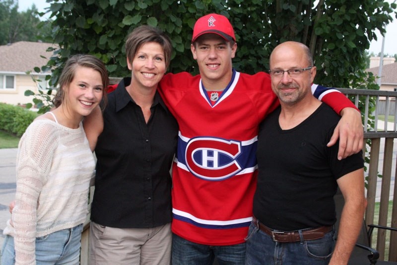 The Koberstein family poses for a group picture after Nikolas returned home from the Montreal Canadiens Development Camp. Pictured (from l-r): Maddie, Monica, Nikolas and