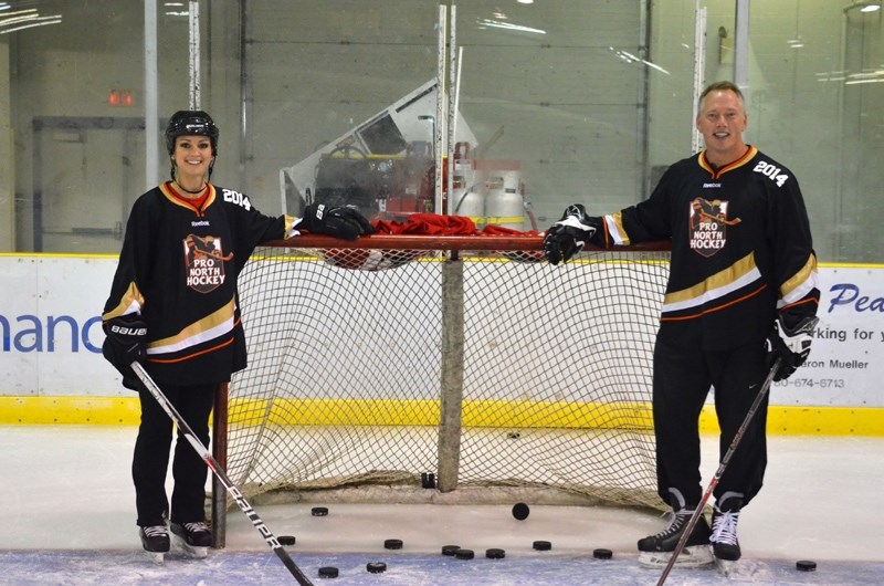 SportsCentre anchors Kate Beirness (left) and Darren Dutchyshen made an appearance at the Pro North Hockey Camp on Monday, August 18.