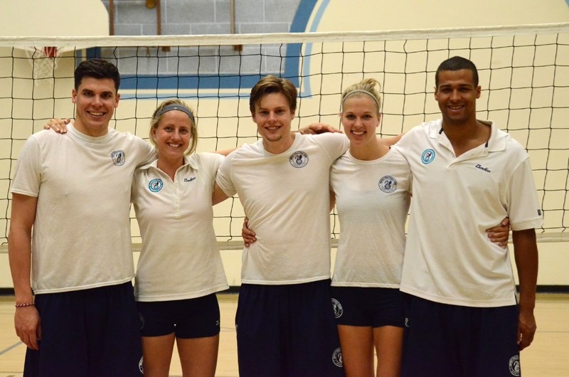 Impact Volleyball Camp coaches pose for a group picture during a break in the camp. Pictured (from l-r): Casper Munk Christiansen, Anneka Hastings, Martin Stenderup, Lykke