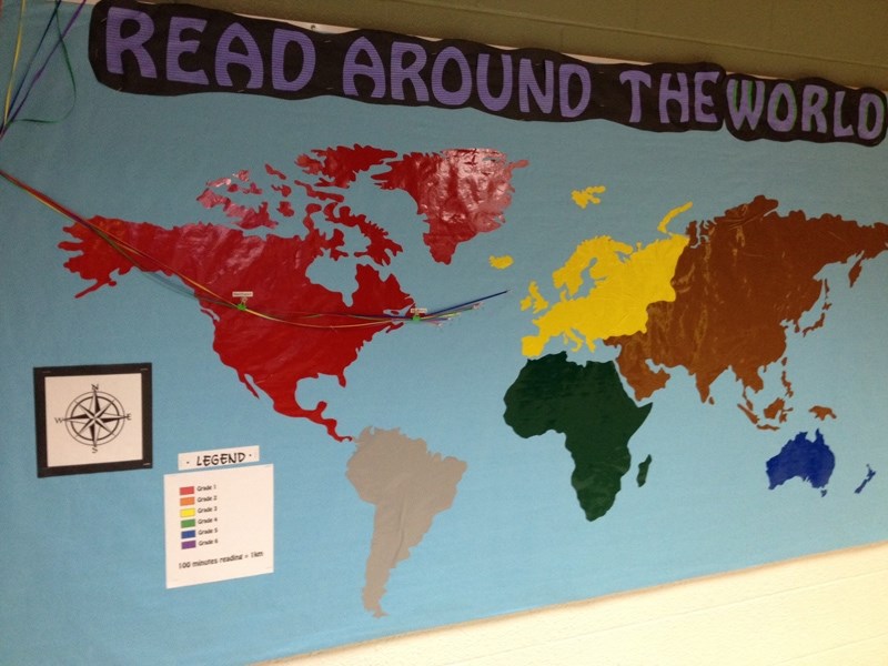 The map posted just outside of the school office keeps track of the student &#8216;s process as they read their way around the world.