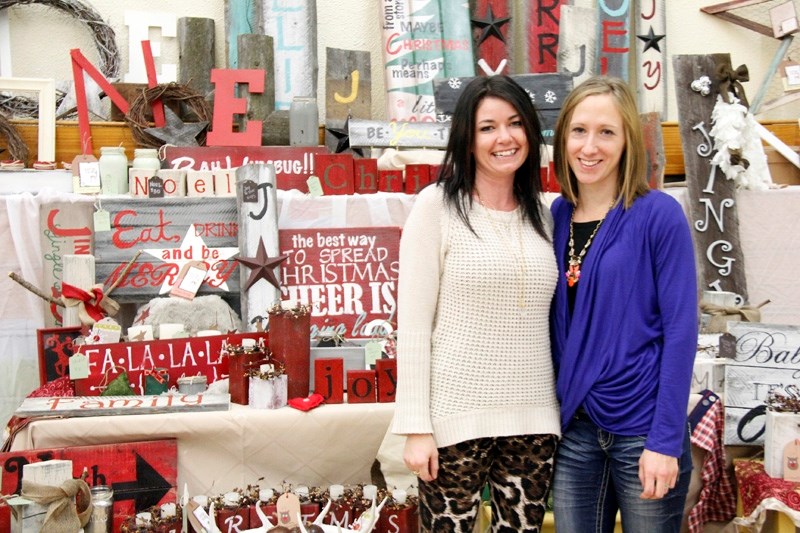 Barn Owl Creations is new to the area, with Holly Couiyk, left, and Aimee Fulcher, right, both creating items by hand including signs, picture holders and other crafted items.