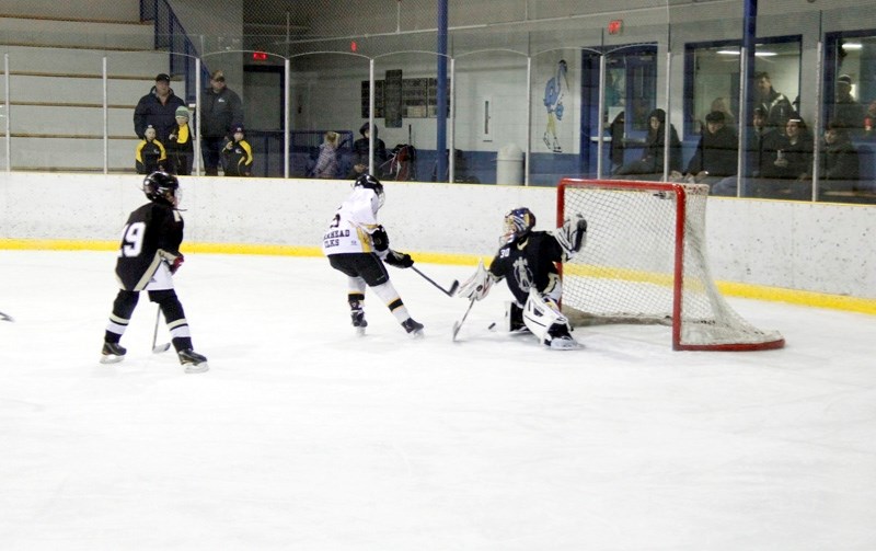 Kyle Keinfeldt goes for a shot on the Drillers net during their game against Devon. The shot was saved, but Kleinfeldt brought it back around by later scoring the first goal