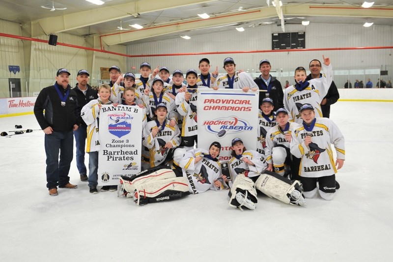 The Barrhead Banatam Pirates team pose on the ice for one final team picture after winning the Provincial Bantam B Championship in Devon on March. 15. The Pirates are: Nick