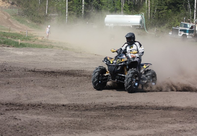 One of the event organizers, Mike Battenfeld, takes a turn during the chariot quad event.