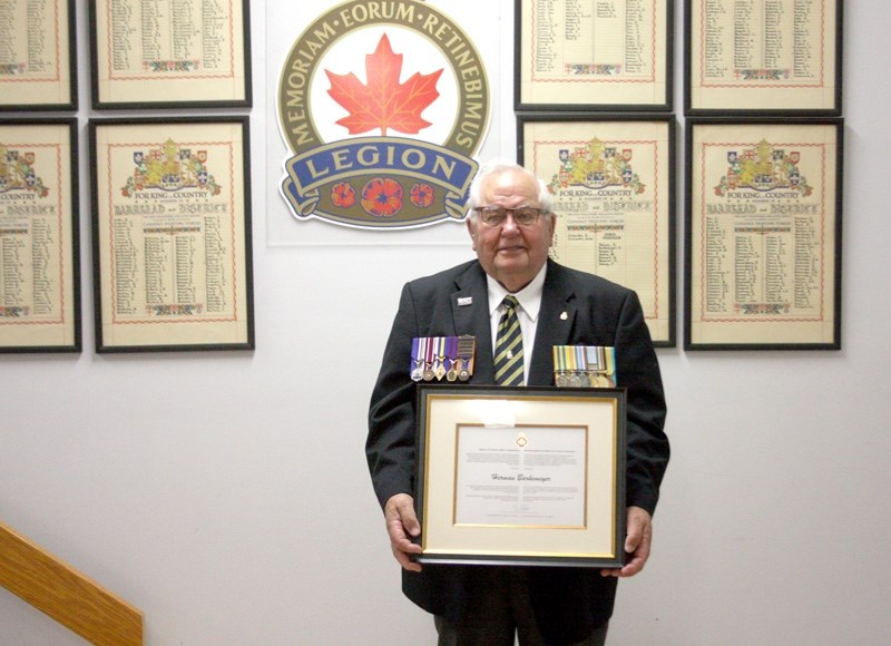 Herman Barkemeyer, 82, displayed the commendation he was awarded by veteran affairs minister Erin O &#8216;Toole, at the Royal Canadian Legion, on Wednesday, July 29, 2015.
