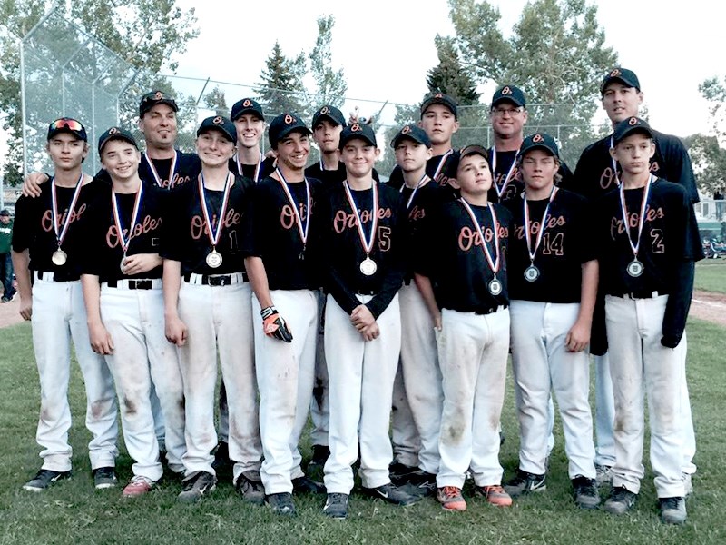 The Barrhead Bantam AA Orioles pose together after winning the silver medal in the Alberta Bantam Baseball Provincial Championships in Calgary. The Orioles are: Spencer