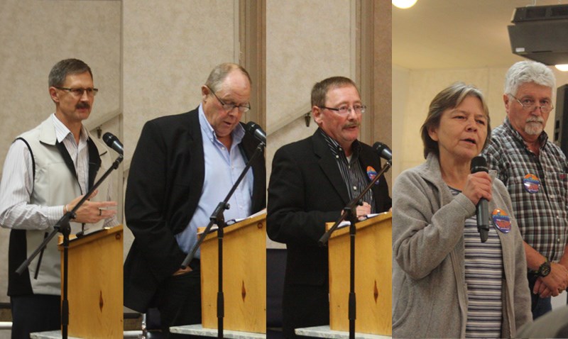 L-R: County of Barrhead Manager Mark Oberg, County Reeve Bill Lee, Barrhead Mayor Gerry St. Pierre, and Cheryl Callihoo, director of planning and development for the town,