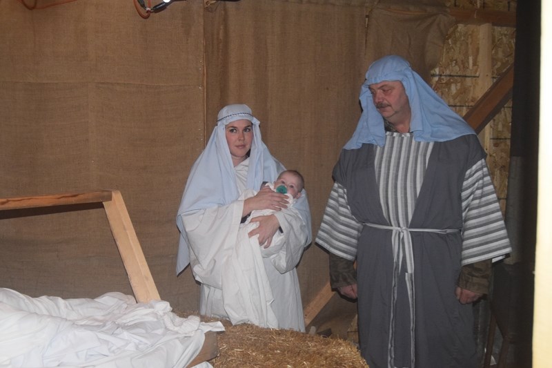 Mary and Joseph (Amy Ellens and Peter Albers) along with baby Jesus (Anna Ellens) stay in the stables when they can &#8216;t find any accommodations in Bethlehem.