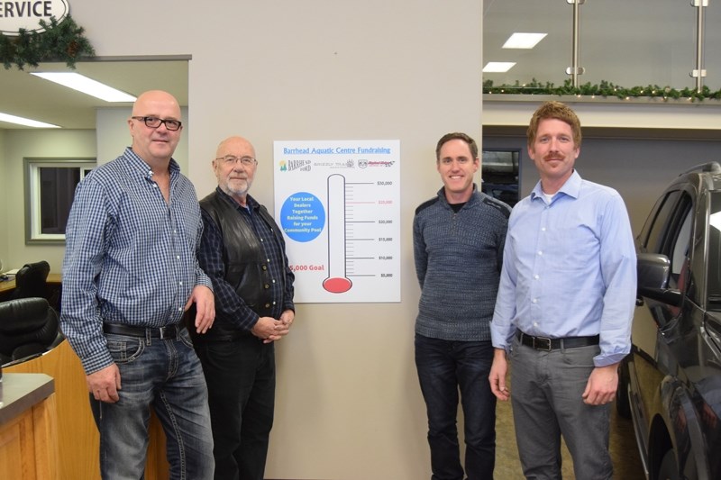 From left: Shannon Carlson, Barrhead Agrena Society president, Dennis Brown, Barrhead Ford, Shawn Stephani, Stephani Motors and Tate McNelly, Grizzly Trails, kick off the