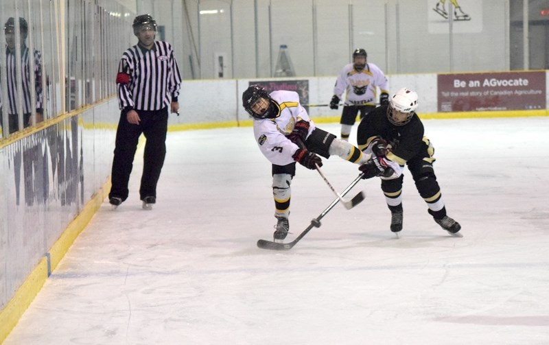 Barrhead Flyer Kaleb Timm takes an off-balanced shot in the first period.