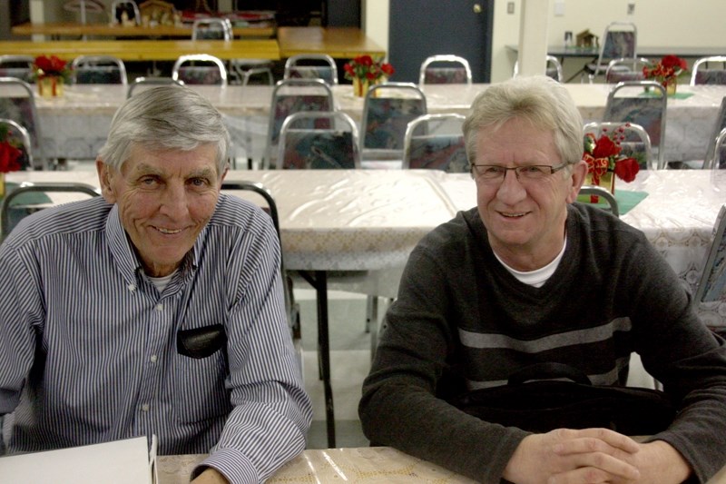 Clifford Tuininga and Ralph Helder, pictured here, were at the Barrhead United Church on Dec. 9 to add their voices to the group concerned about refugee welfare.