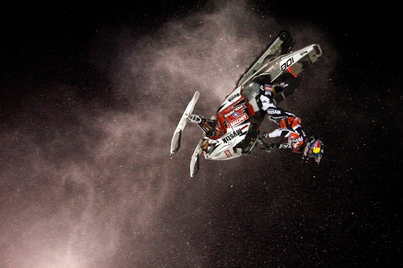 Levi Lavallee performs a front-flip during the World Snowmobile Invasion in Whitecourt on Sunday, Feb. 15.