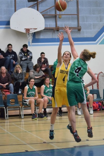 Taryn Strydhorst takes a jump shot.