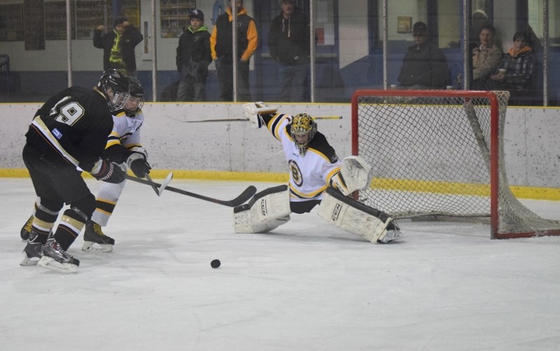 Ty Steinbring stretches out to make a save.