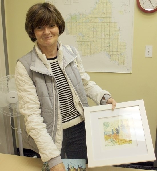 Barrhead Art Club president JoAnn Nanninga, pictured here, has a number of art pieces on display currently at the club &#8216;s gallery and is the artist of the month.