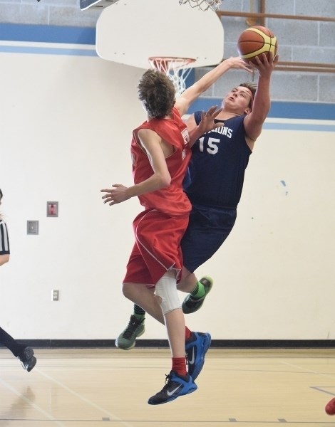 Tanner Whiting goes up for a shot late in the fourth quarter.