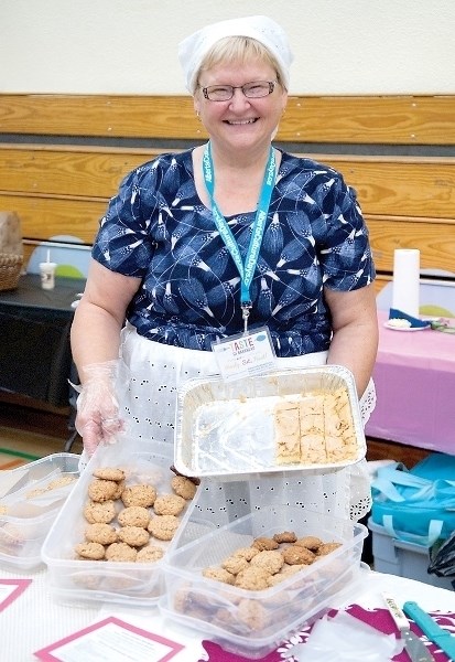 Darlene Braucht, dressed in proper ethnic attire, cooked an authentic Ukrainian meal.